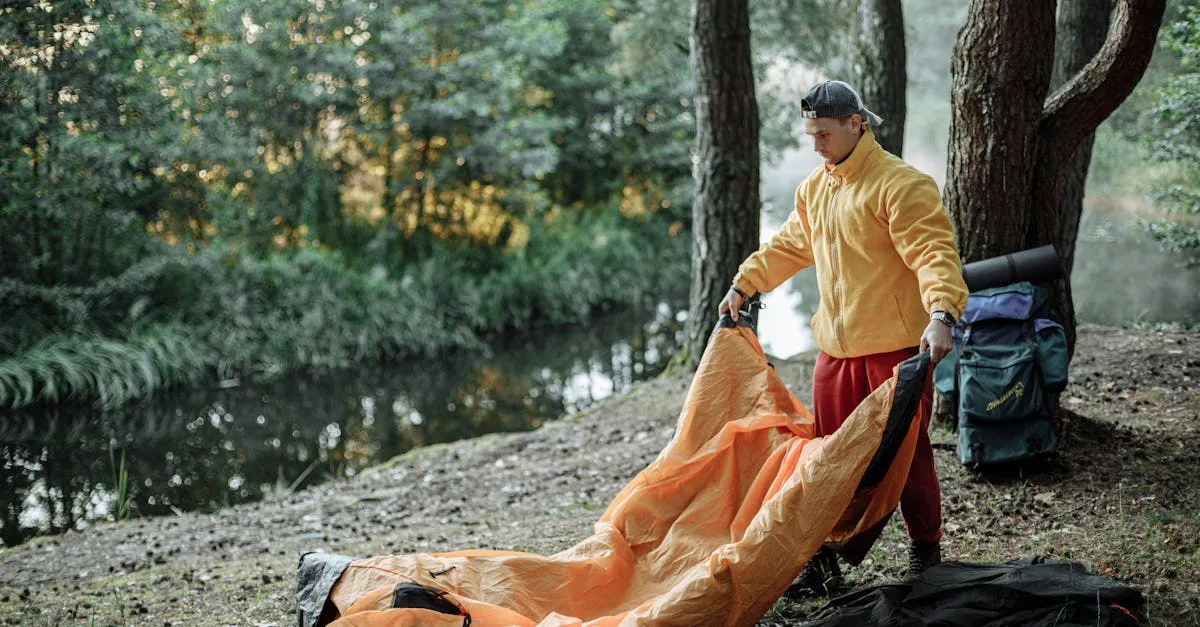 Person setting up tent for wild camping
