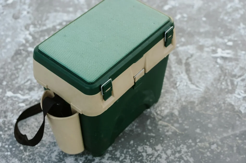 Camping cool box with ice at an outdoor campsite