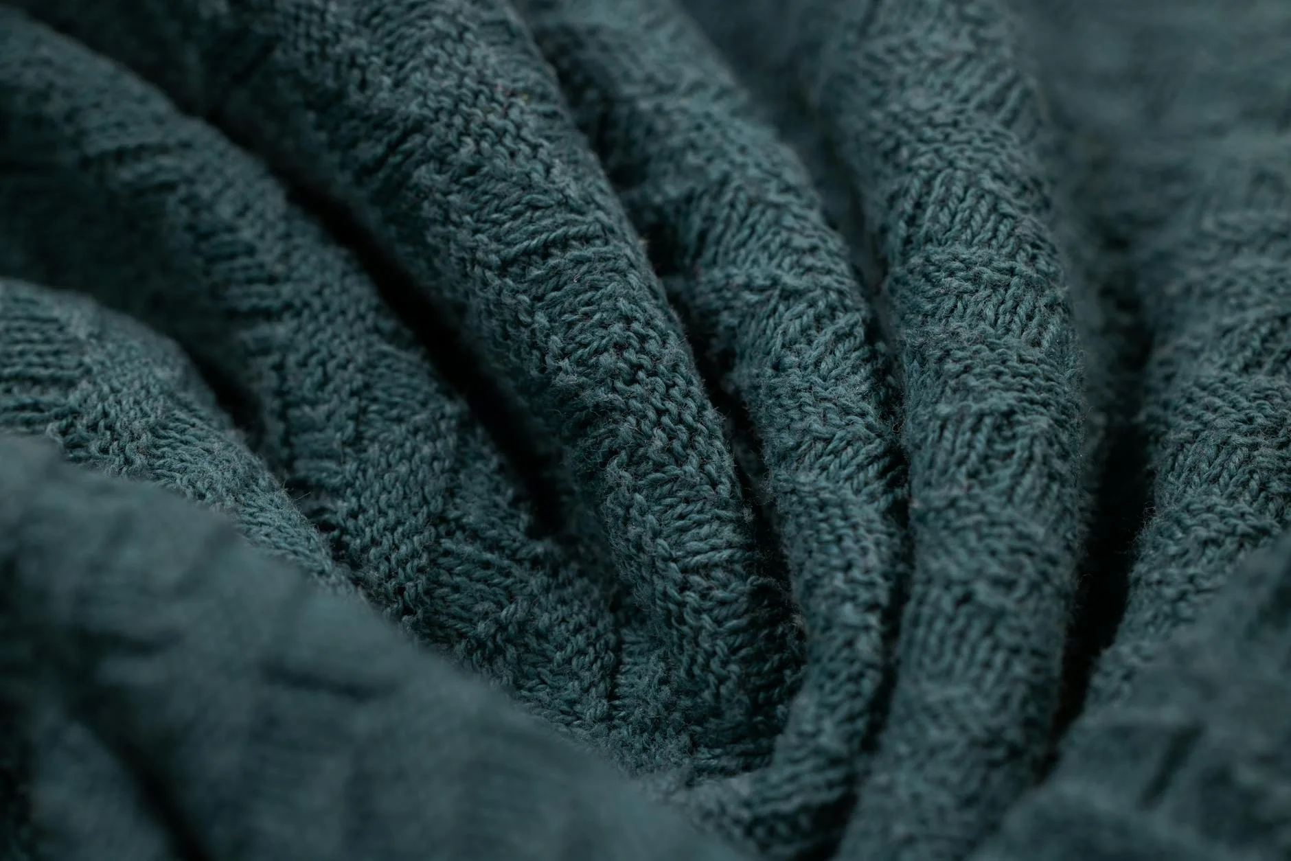 Folded merino wool fabric in soft natural tones