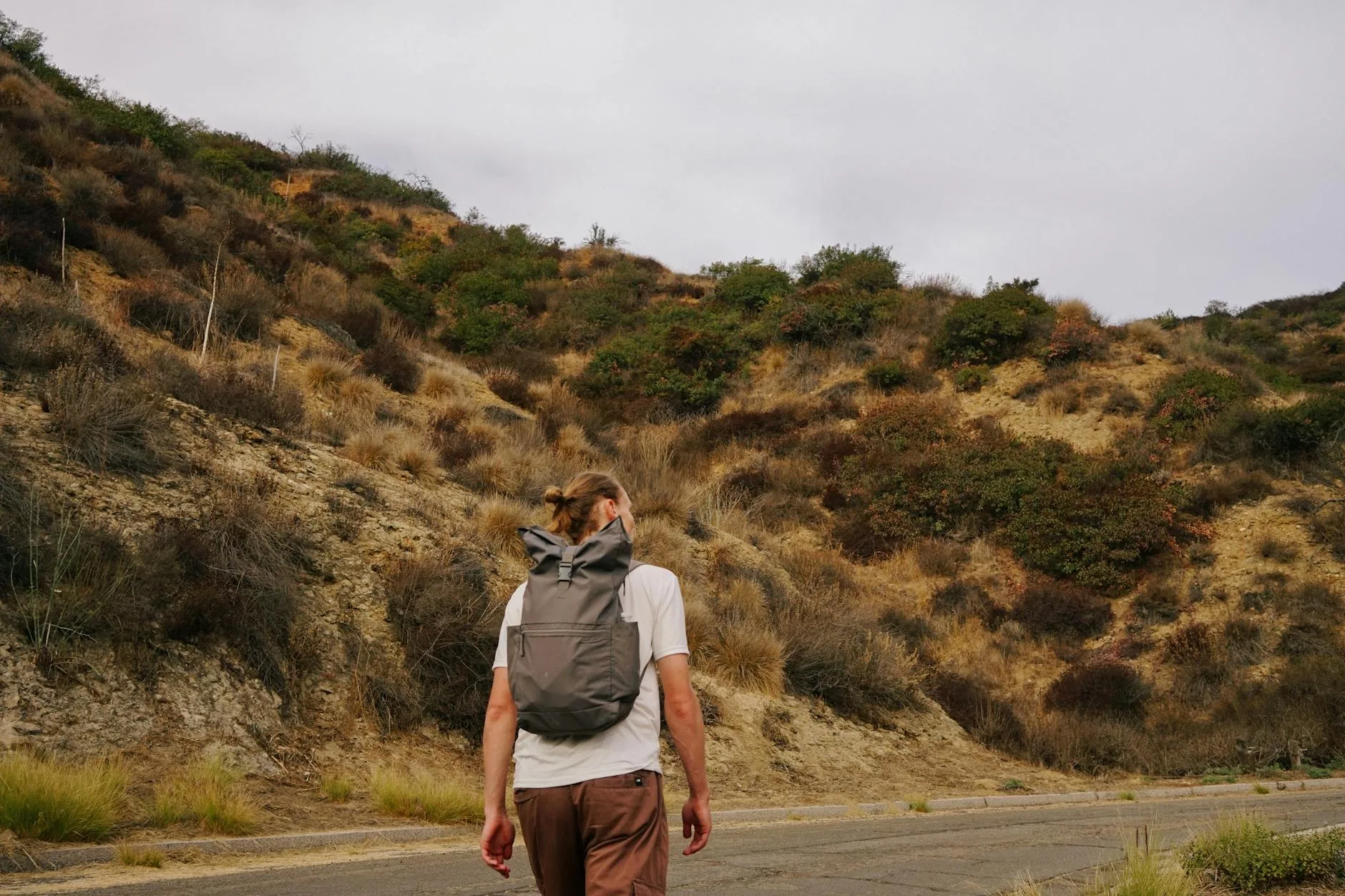 Roll-top waterproof rucksack packed for an outdoor adventure