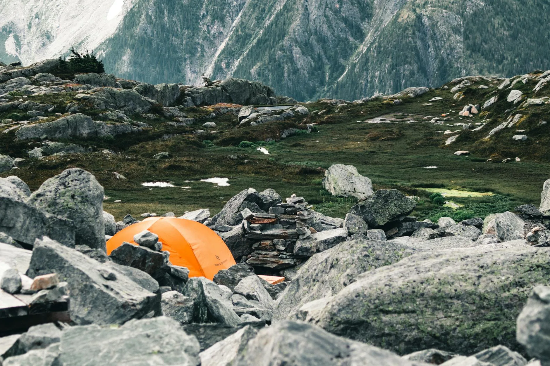 Wild camping tent in a scenic UK mountain landscape