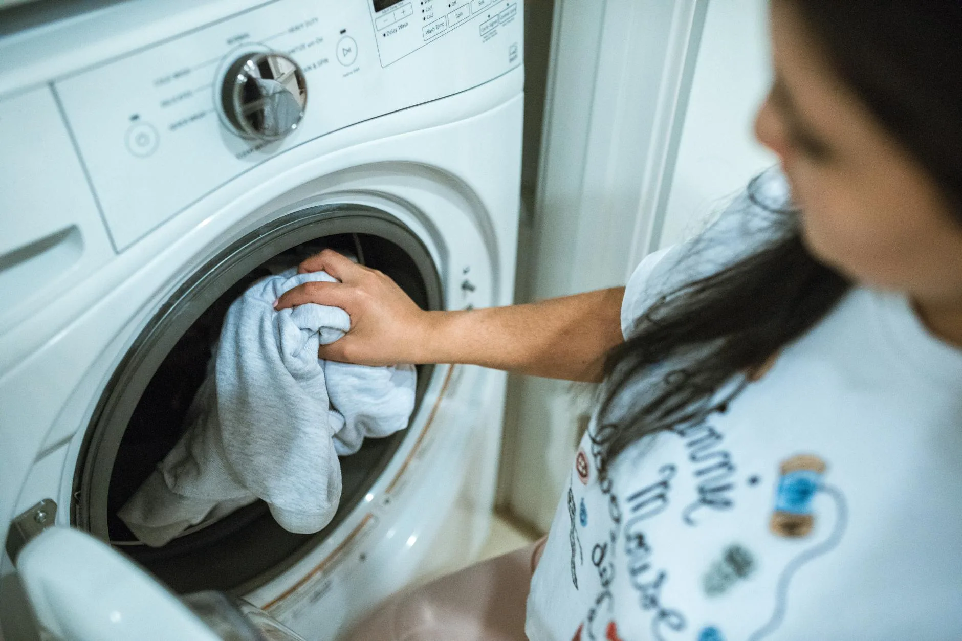 Waterproof jacket being washed in a washing machine