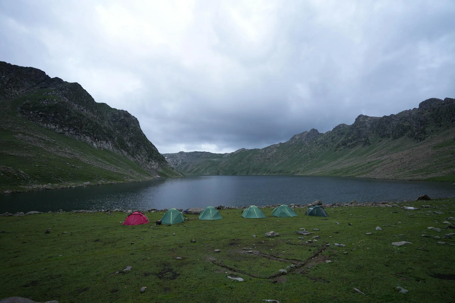 Wild camping by a lake in the UK mountains