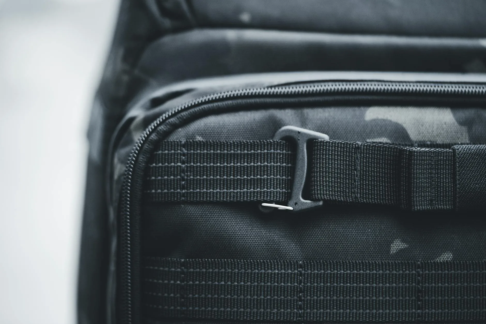 Close-up of backpack straps and hip belt adjustment